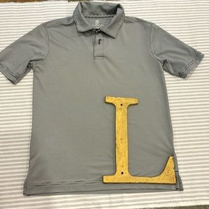 Boys size 10/12 short sleeve, collared, dry fit shirt